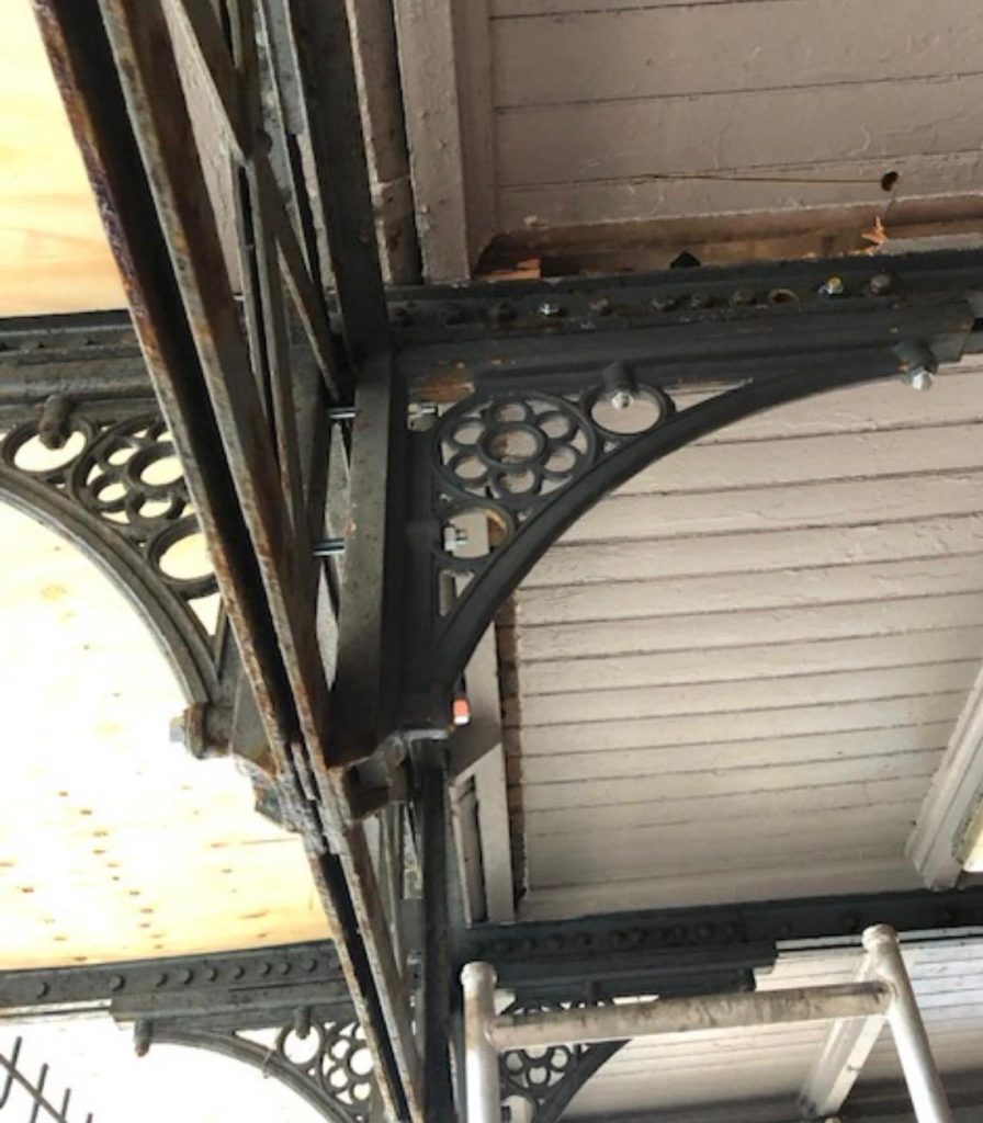 Cast iron canopy bracket installed at Cobh railway station during heritage restoration